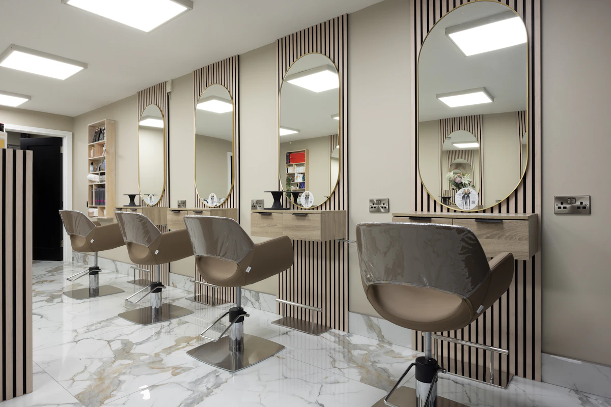 Contemporary hair salon with chairs and mirrors
